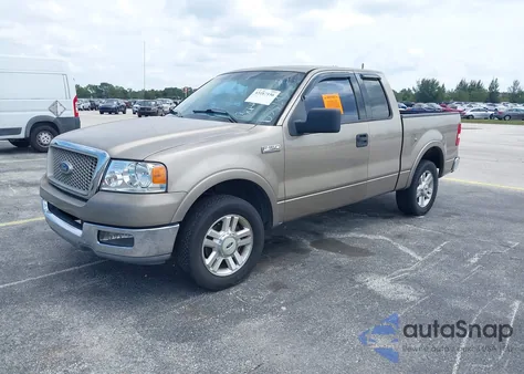 2004 Ford F-150 Lariat/Xlt z USA, uszkodzony, nr VIN 1FTRX12594KD56295